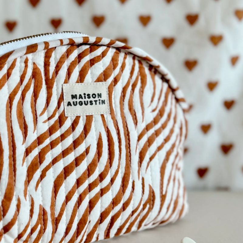 trousse à maquillage ou essentiels bébé maison augustin